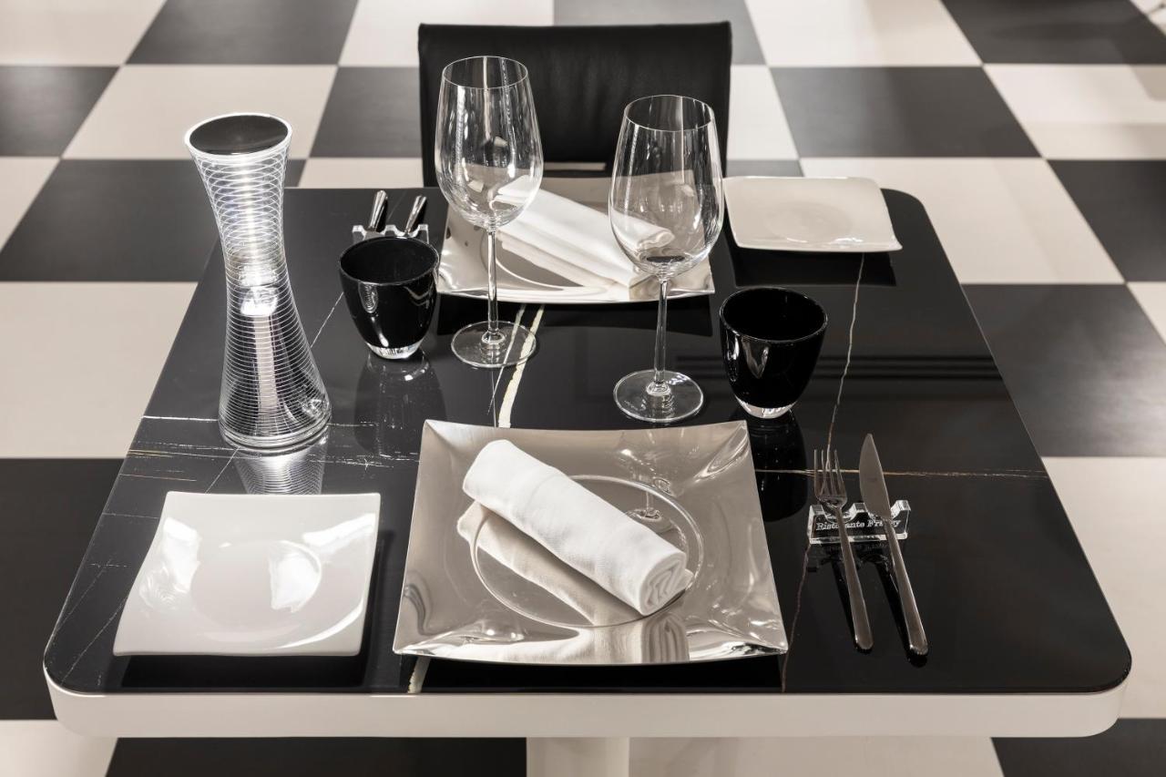 LHP Napoli Palace&SPA Esterno foto A place setting